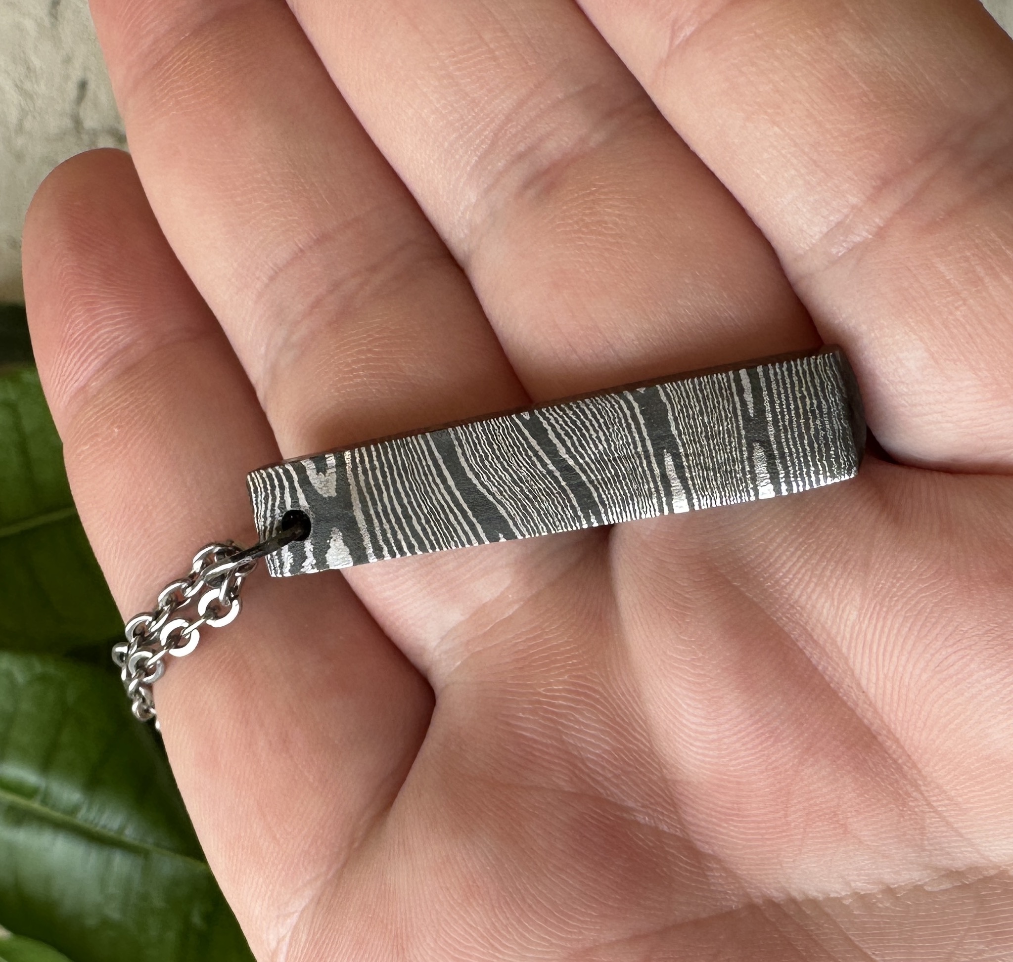 twisted damascus steel pendant